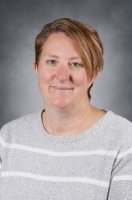 Picture of a person wearing a grey shirt